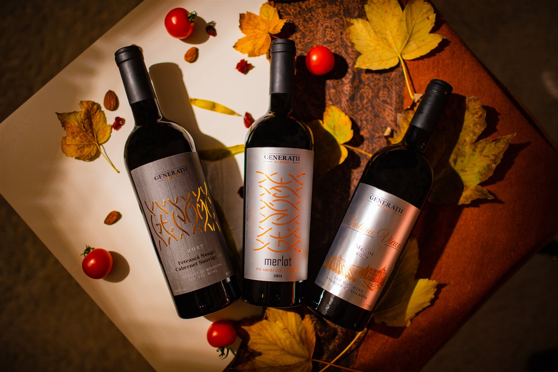 Generatii family wine collection with autumn leaves